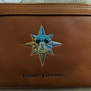 Dooney and Bourke Disney Passport Wristlet 2 avail